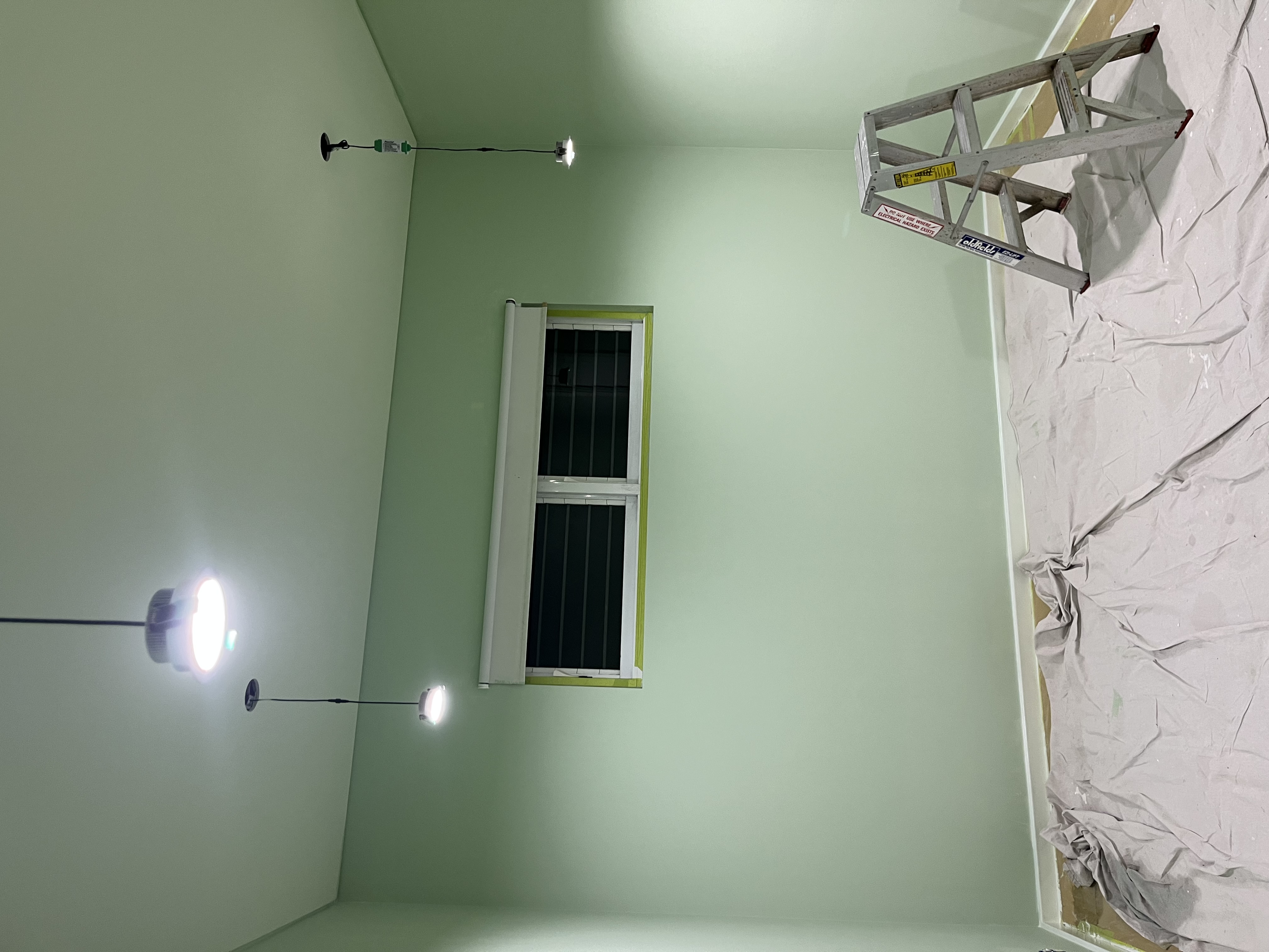 Before and after of a living-room repaint