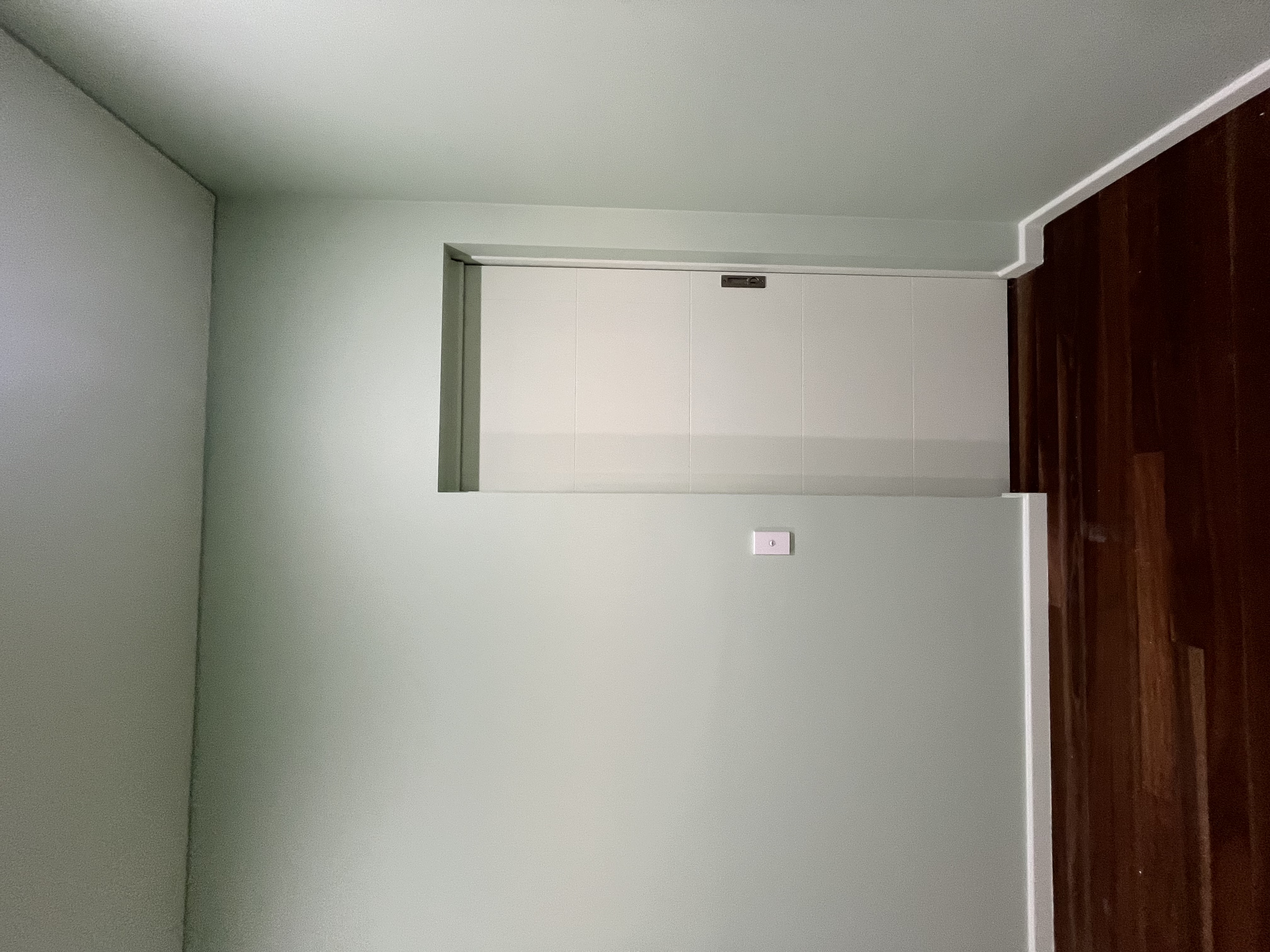 Before and after of an exterior repaint